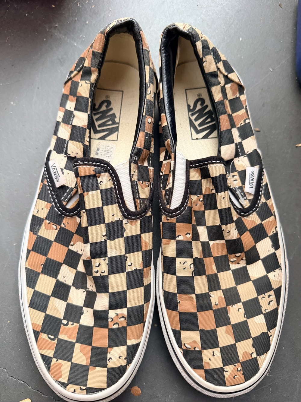 Vans Checkerboard Slip-On Sneakers in Black & Tan